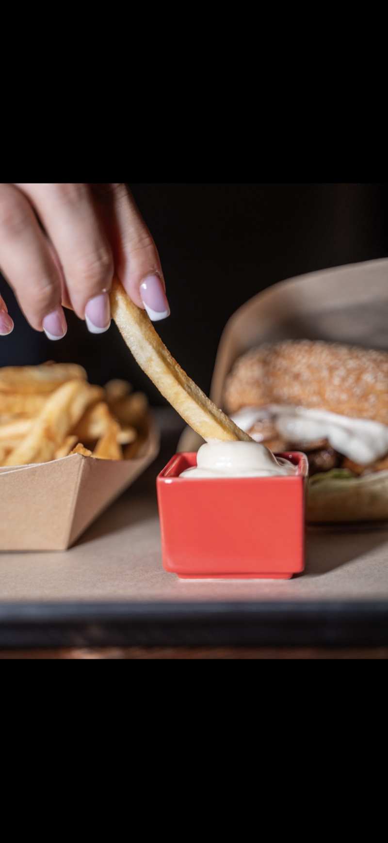 FOOD Str cheeseburger in branded kraft paper wrap
